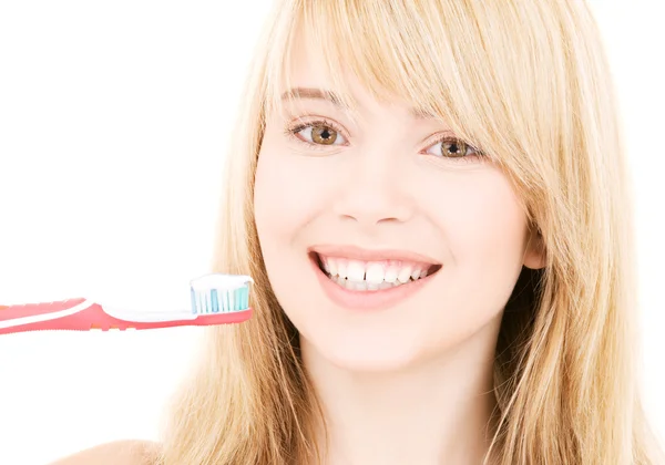 Chica feliz con cepillo de dientes — Foto de Stock