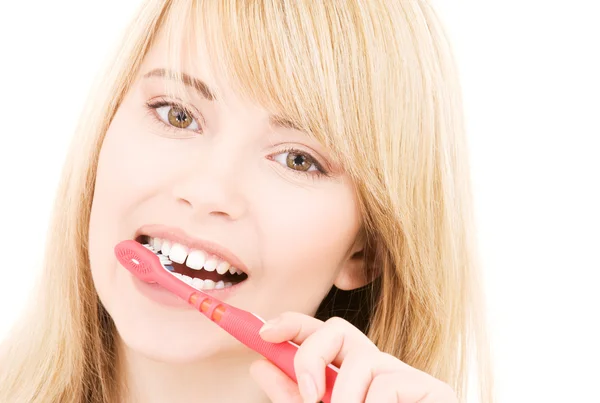 Menina feliz com escova de dentes — Fotografia de Stock