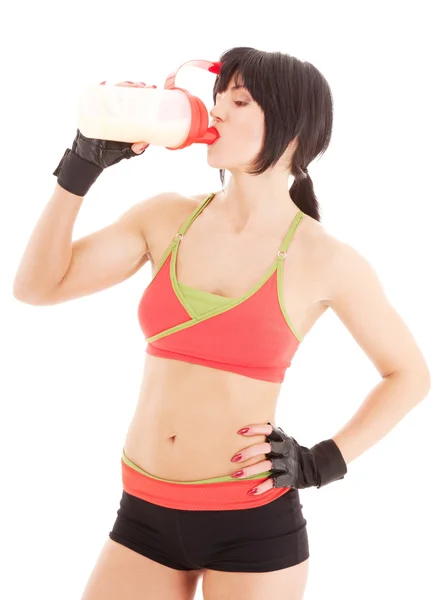 Fitnesstrainerin mit Proteinshake — Stockfoto