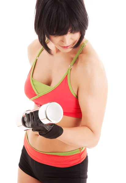 Muskulöser Fitnesstrainer mit Kurzhanteln — Stockfoto
