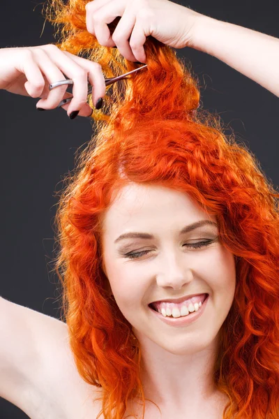 Redhead with scissors — Stock Photo, Image