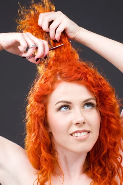 Redhead with scissors — Stock Photo, Image
