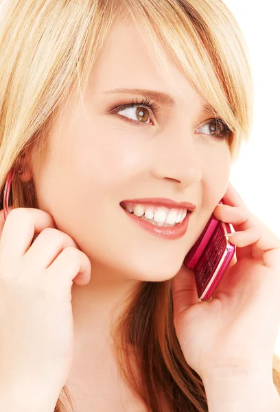 Menina feliz com telefone rosa — Fotografia de Stock