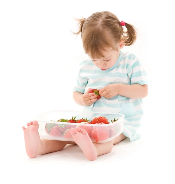 Little girl with strawberry — Stock Photo, Image