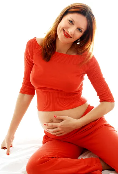 Embarazada en rojo — Foto de Stock