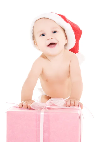 Papai Noel ajudante bebê com presente de Natal — Fotografia de Stock