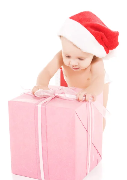 Санта помічник дитину з різдвяні подарунки — стокове фото