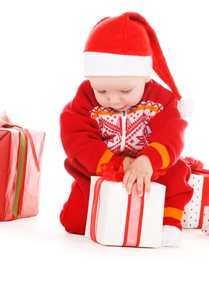 Papai Noel bebê ajudante com presentes de Natal — Fotografia de Stock