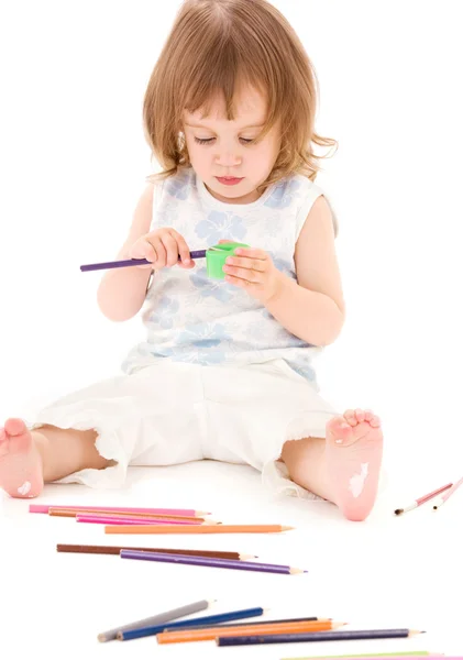 Kislány a színes ceruzák — Stock Fotó