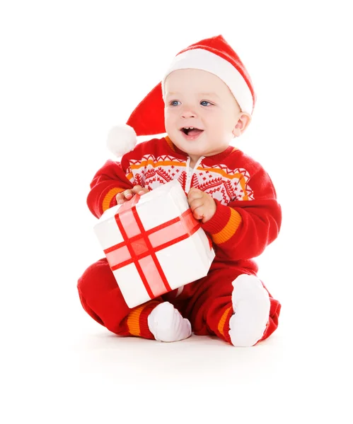 Santa βοηθός μωρό με χριστουγεννιάτικο δώρο — Φωτογραφία Αρχείου