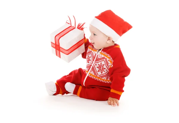 Papai Noel ajudante bebê com presente de Natal — Fotografia de Stock