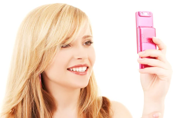 Chica adolescente feliz con teléfono celular Imagen de stock