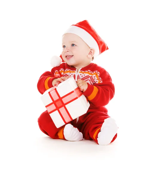 Santa pomocníka dítě s vánoční dárek Stock Fotografie