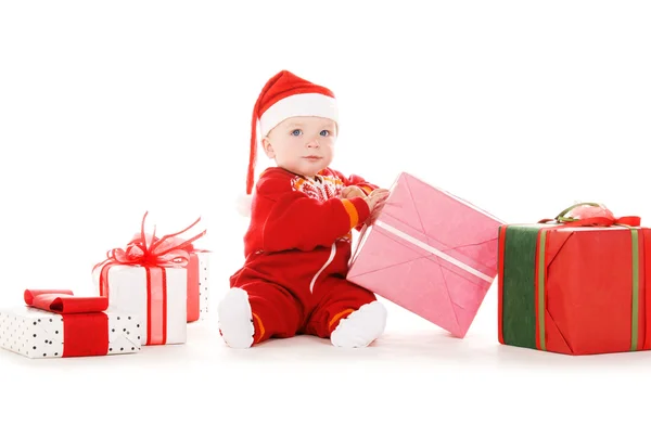 Papai Noel bebê ajudante com presentes de Natal Imagens De Bancos De Imagens Sem Royalties