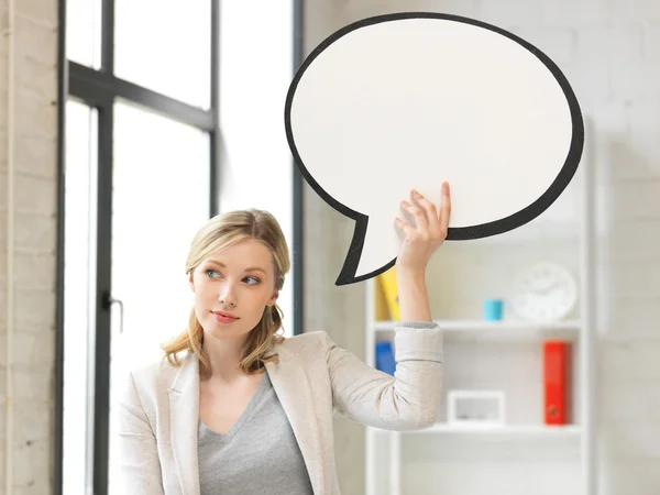 Thinking businesswoman with blank text bubble — Stock Photo, Image