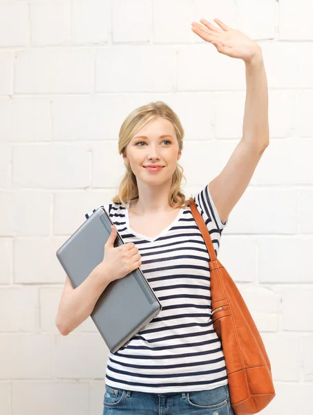 Glad tonårsflicka vifta med en hälsning — Stockfoto