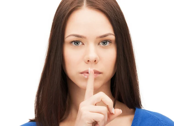 Picture of woman with finger on lips — Stock Photo, Image