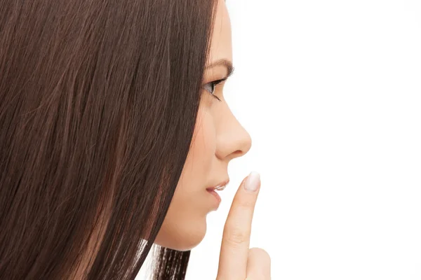 Εικόνα γυναίκας με το δάχτυλο στα χείλη — Φωτογραφία Αρχείου