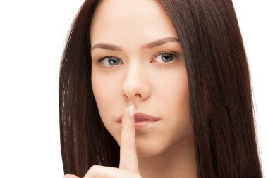 Picture of woman with finger on lips clipart