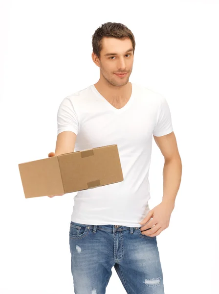 Homem bonito com caixa — Fotografia de Stock