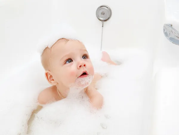Infant in soap foam — Stock Photo, Image