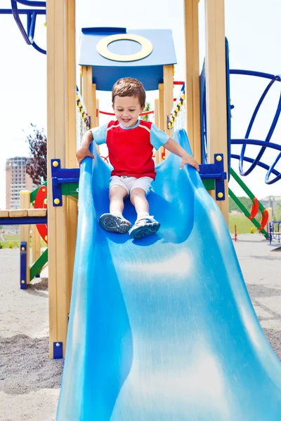 Boy on a slide — Stock Photo, Image