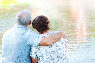 Senior couple embracing clipart