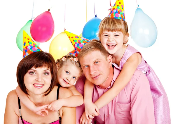Familia en sombreros de fiesta —  Fotos de Stock