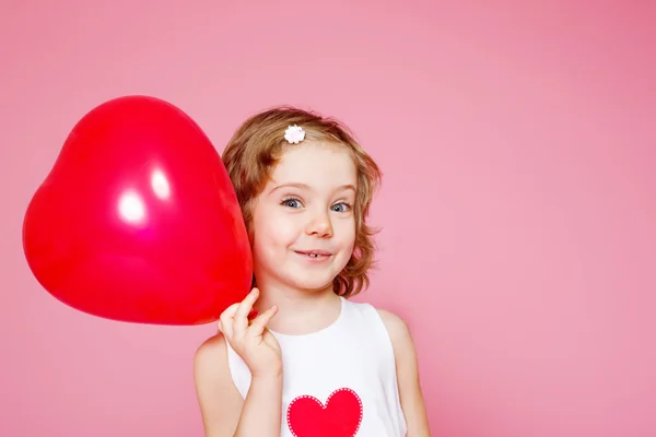 Girl with a red balloon — Stock Photo, Image