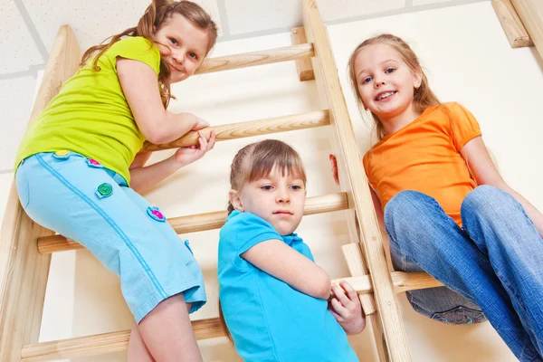 Three kids in bright clothing — Stock Photo, Image