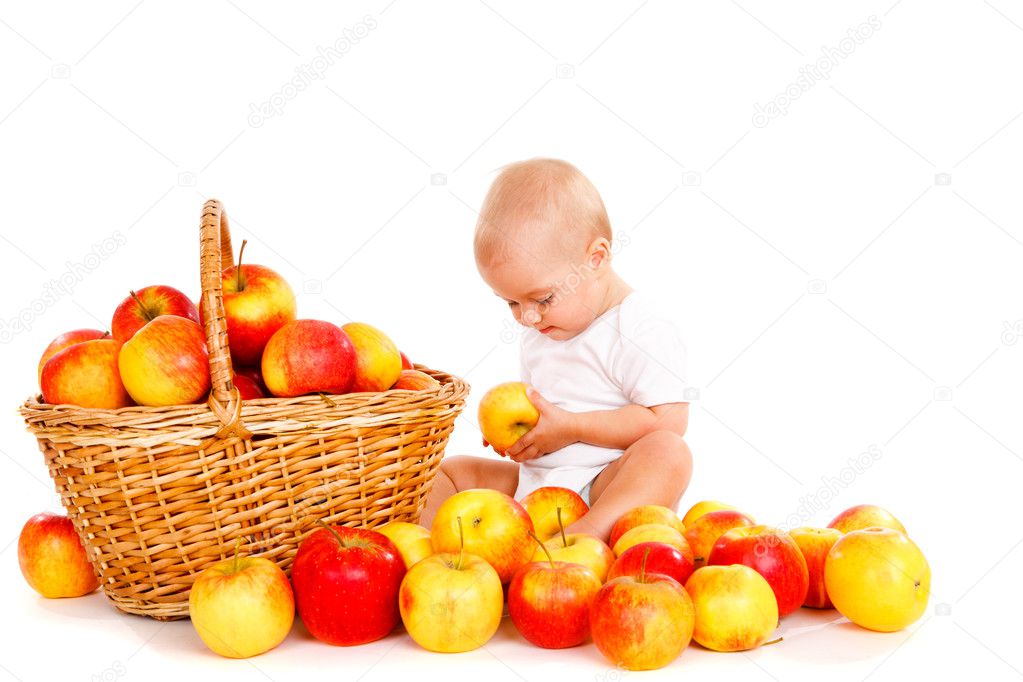 Baby playing with apples