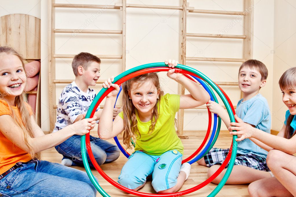 Children holding hula hoops