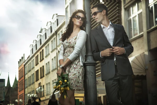 Adorable couple on the middle of a promenade Royalty Free Stock Images