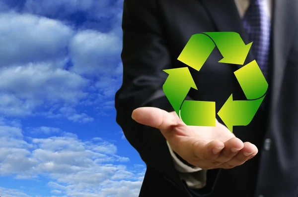 Business man hand shows recycle symbol — Stock Photo, Image