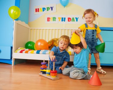 Boys and girl playing on birthday party clipart