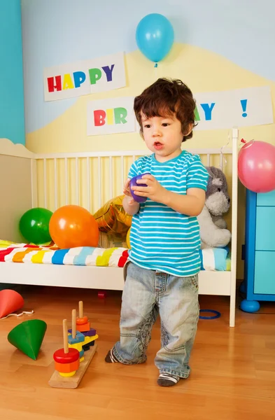 Asian kid playing with toys — Stock Photo, Image
