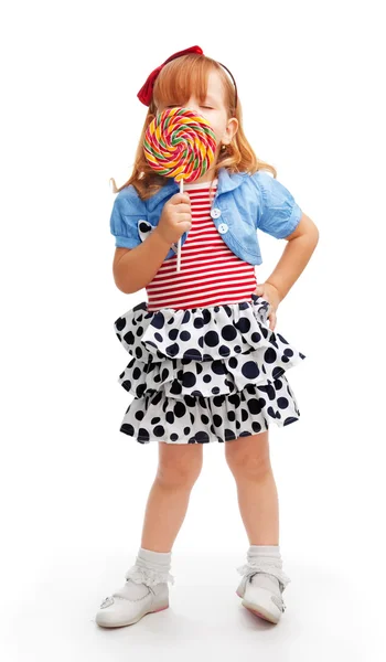Njuter av lollipop — Stockfoto