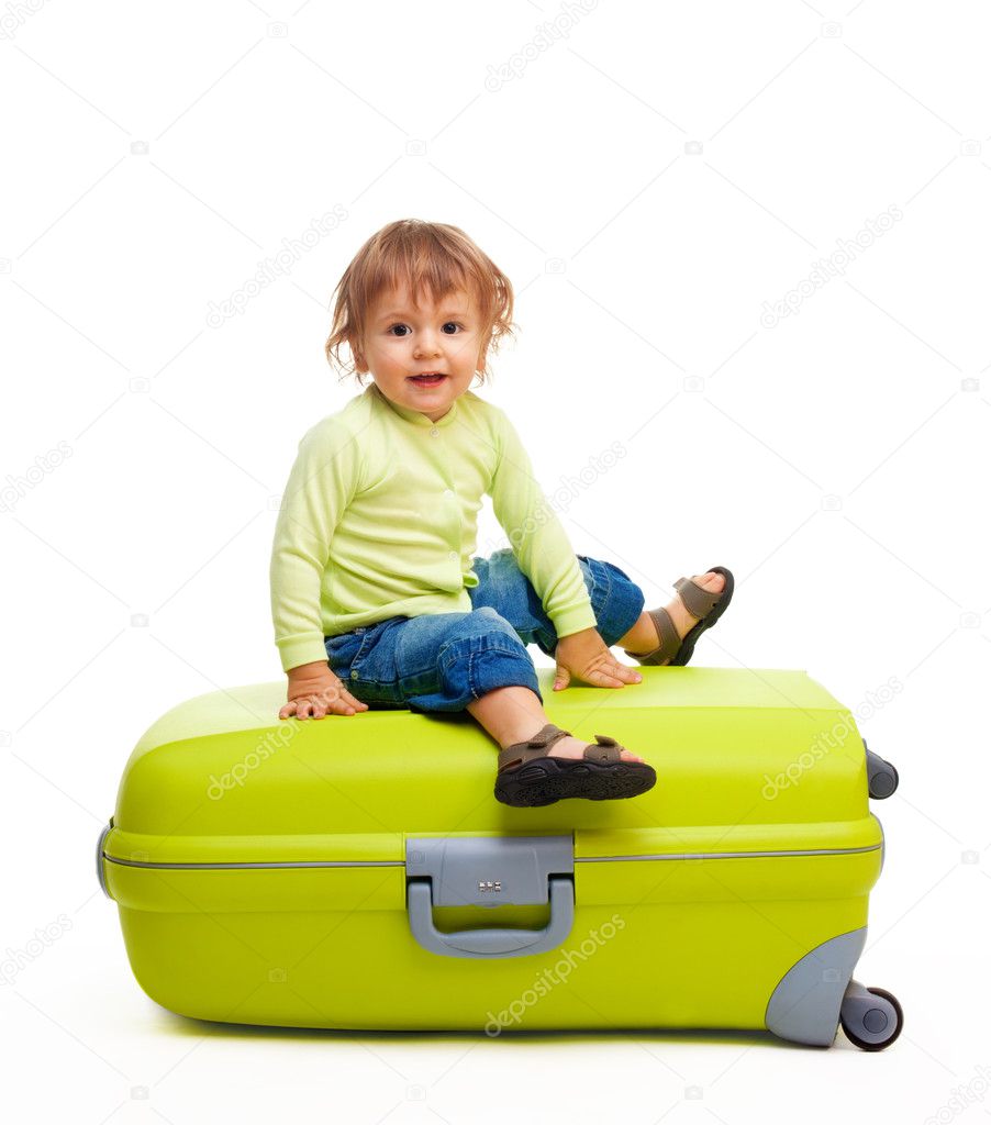 Happy kid with baggage