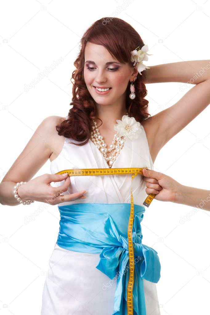 Measuring waist of a bride