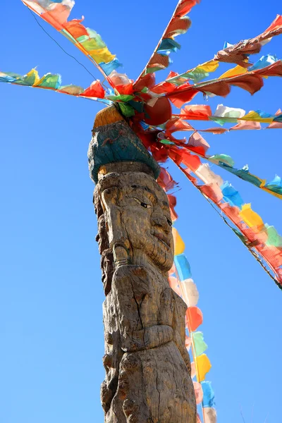 stock image Totem Pole and Prayer Flags