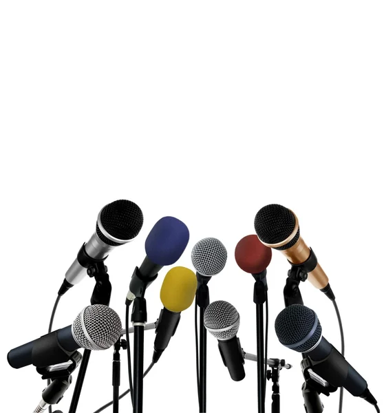 Press conference with standing microphones — Stock Photo, Image
