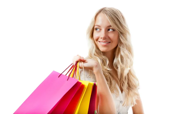 Blonde vrouw bedrijf shopping tassen — Stockfoto