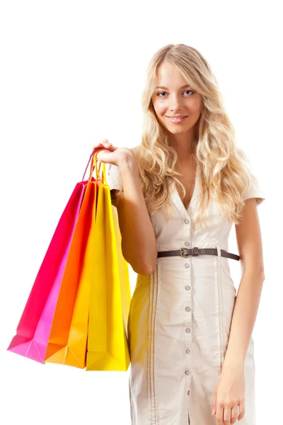 Blondýnka hospodářství nákupní tašky — Stock fotografie