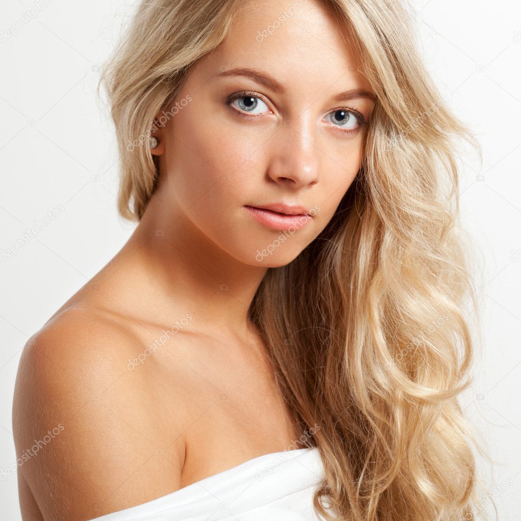 Beautiful blonde woman face portrait