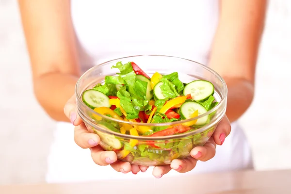 Woman holding salad Stock Image