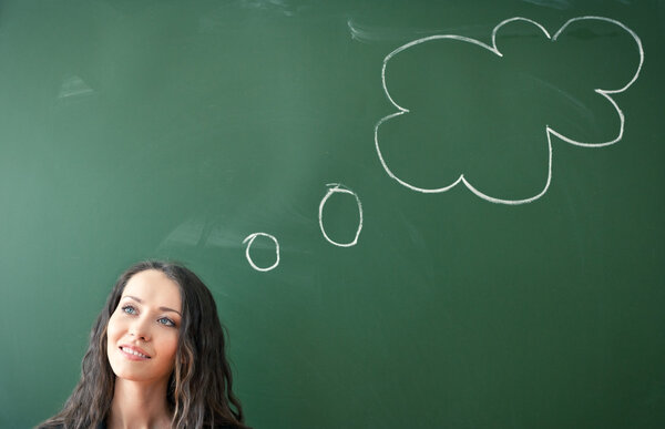 Woman over blackboard with cloud