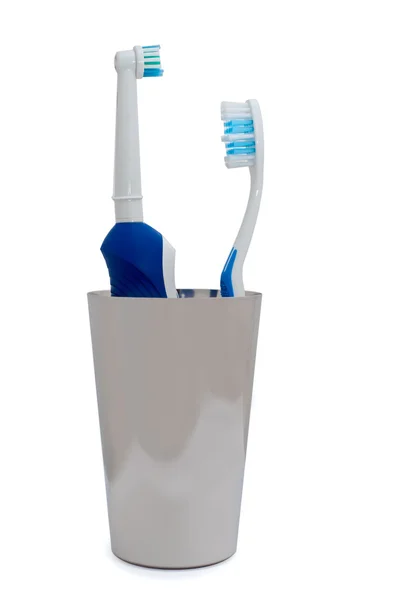 Elektrisk tandborste och vanliga tandborste — Stockfoto