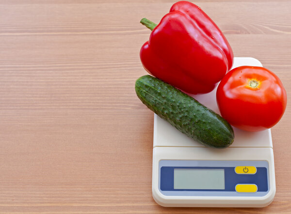 Овощи в электронном масштабе
