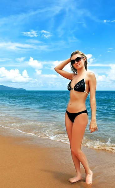 Pretty woman in bikini and glasses — Stock Photo, Image