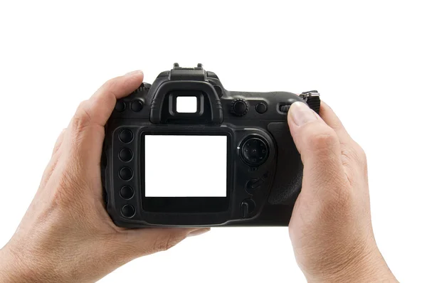 Mani che tengono fotocamera reflex digitale — Foto Stock